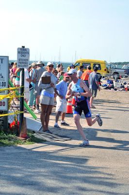 Triple Threat
The 2008 running of the Mattapoisett Lions Club Triathlon was held at the Mattapoisett Town Beach on Sunday morning, July 13, beginning at 8:00 am. This year 173 participants attempted the triple event which began with a swim in Mattapoisett Harbor, a bike ride into the town village, and a marathon back to the Town Beach. (Photo by Robert Chiarito).
