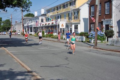 Triple Threat
The 2008 running of the Mattapoisett Lions Club Triathlon was held at the Mattapoisett Town Beach on Sunday morning, July 13, beginning at 8:00 am. This year 173 participants attempted the triple event which began with a swim in Mattapoisett Harbor, a bike ride into the town village, and a marathon back to the Town Beach. (Photo by Robert Chiarito).
