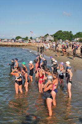 Triple Threat
The 2008 running of the Mattapoisett Lions Club Triathlon was held at the Mattapoisett Town Beach on Sunday morning, July 13, beginning at 8:00 am. This year 173 participants attempted the triple event which began with a swim in Mattapoisett Harbor, a bike ride into the town village, and a marathon back to the Town Beach. (Photo by Robert Chiarito).
