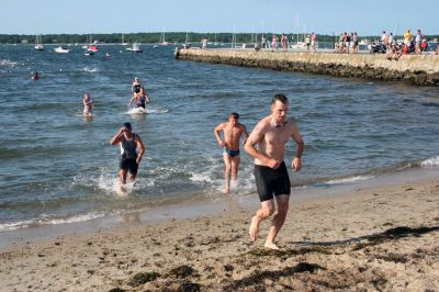 Triple Threat
The 2008 running of the Mattapoisett Lions Club Triathlon was held at the Mattapoisett Town Beach on Sunday morning, July 13, beginning at 8:00 am. This year 173 participants attempted the triple event which began with a swim in Mattapoisett Harbor, a bike ride into the town village, and a marathon back to the Town Beach. (Photo by Robert Chiarito).
