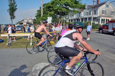 Triple Threat
The 2008 running of the Mattapoisett Lions Club Triathlon was held at the Mattapoisett Town Beach on Sunday morning, July 13, beginning at 8:00 am. This year 173 participants attempted the triple event which began with a swim in Mattapoisett Harbor, a bike ride into the town village, and a marathon back to the Town Beach. (Photo by Robert Chiarito).
