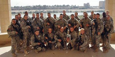 Palace Platoon
2nd Platoon, Crazy-Troop, 3rd Squadron 7th U.S. Cavalry pose on the balcony of a former Uday Hussein palace in Baghdads Adamayia district. L. to R., front: SPC Gentile, PV2 Lawson, SPC Zehme, PFC Patrick, PFC Kimble; middle: SFC Shoffner, SSG Winkel, SSG Faulkner, SGT Van Wyk, SSG Liebsch, SGT Lopez, SGT Whipple, PFC Philbrook, SSG Doerfler; rear: PFC Rekow, PFC Boyd, SPC Gilispie, SPC Jerolmen, SPC Schaub, PVT Martinez, 2LT Wilkin, SSG Bull, SGT Hardman, PFC Manzo, PFC Syphus, SGT Harp, PFC Woodbridge.
