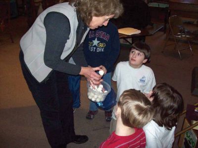 Talking Turtle
Pictures of Marion Natural History Museum's Sea Turtle program with Karen Dourdeville. During the program we talked about the life history of sea turtles and saw slides of the turtles that can be found in Buzzards Bay, and learned what we can do to help protect them.  We also examined the museum's preserved Hawksbill turtle, and the kids got their very own life sized turtle "egg" made of dough to make into their own baby turtle. (Photos courtesy of the Marion Natural History Museum.)
