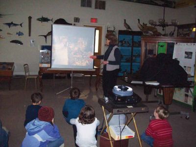 Talking Turtle
Pictures of Marion Natural History Museum's Sea Turtle program with Karen Dourdeville. During the program we talked about the life history of sea turtles and saw slides of the turtles that can be found in Buzzards Bay, and learned what we can do to help protect them.  We also examined the museum's preserved Hawksbill turtle, and the kids got their very own life sized turtle "egg" made of dough to make into their own baby turtle. (Photos courtesy of the Marion Natural History Museum.)
