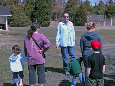 Welcome to the Camp
Carl Robideau, Director of Camp Massasoit at the Mattapoisett branch of the YMCA Southcoast, recently led a tour of the summer camp facility on April 21 to provide prospective parents with an overview of what the program has to offer. Camp Massasoit offers programs for children of all ages starting with their Scamper Camp program aimed at preschool aged children, 4 to 5 years of age, up to their Counselor-In-Training program for teenagers, 15 to 16 years of age. (Photo by Robert Chiarito).
