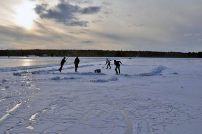 Winter of Discontent
Kenny Pimental, Randy Tanque, Zach Ruscik and George Quirk of Fairhaven didnt let temperatures in the teens stop them from an agressive game on the frozen Acushnet Road cranberry bogs in Mattapoisett recently. (Photo by Tim Smith).
