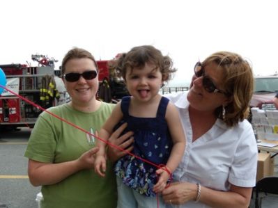 Women's Auxiliary
Jessica Collyer, left, and Joanne Collyer, right, pose with Hazel Kakley, center. The Collyers were among several volunteers handing out balloons at the Women's Auxiliary Club booth at the 2009 Harbor Days in Mattapoisett.
