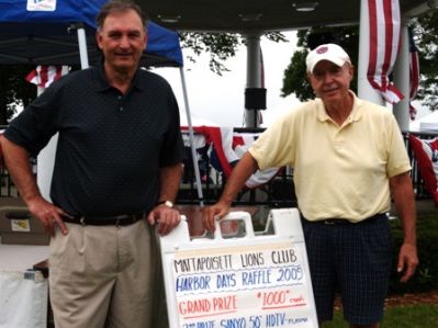 Lions club
Neil Cooper, left, and Bill Calusine, right, are longtime Lion's Club members. They worked the raffle ticket booth for the Lion's Club at the 2009 Harbor Days in Mattapoisett.
