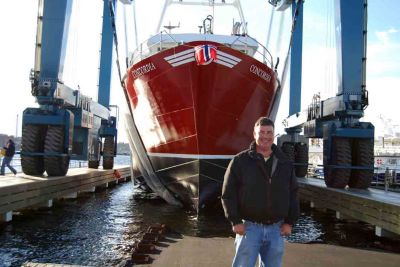 Corcordia Launches
Mattapoisett resident Brian Kvilhaug will skipper the new fishing vessel, Concordia, which was launched in Fairhaven on Friday, December 2, 2011. The 95-foot, 199-ton steel scallop boat is the first built in the area in the past 50 years, and was built at D. N. Kelly’s shipyard in Fairhaven. The Concordia was christened by Allison Kvilhaug, daughter of the skipper. It replaces the original Concordia built in 1946. Photo by Tony Lopes.
