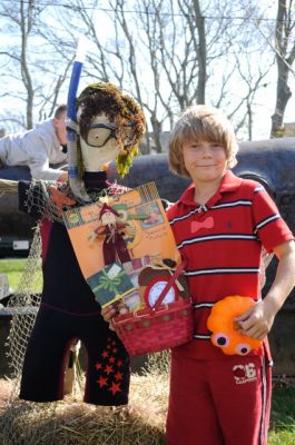 Mattapoisett Library Scarecrow
Reece Cain shows off his scarecrow outside the Mattapoisett Free Public Library on October 15, 2011. Photo by Felix Perez.
