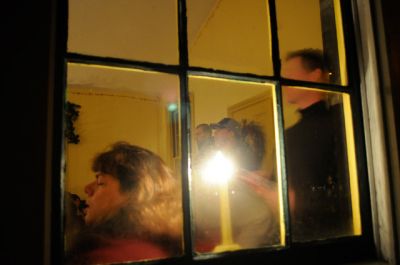 Tinkhamtown Carolers
Carolers gathered at Tinkhamtown Chapel in Mattapoisett on the evening of December 17, 2011, to evoke the Christmas spirit. Revelers enjoyed old holiday song favorites and warmth from a potbelly stove. Photo by Felix Perez.
