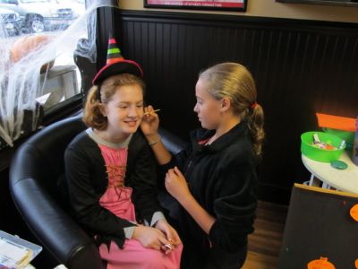 Witch Face Painting
Lauren Ziino, a good witch, gets her face painted by Aubrie Isabelle at the Rochester Plumb Corner Halloween party on October 29, 2011. Photo by Shawn Sweet.
