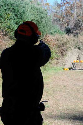 Pumpkin Trap Shooting
Rochester Rod and Gun Club President Dale Williams gets a pumpkin in his cross hairs at a November 5, 2011 trap shooting lesson. Photo by Felix Perez.
