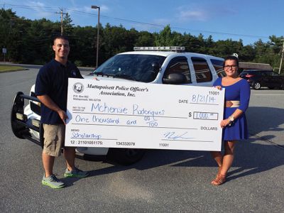 Mattapoisett Police Association
Mattapoisett Police Association President Nicholas Lorenco and Scholarship recipient, McKensie Roderiques,  receiving $1,000 scholarship check. 
