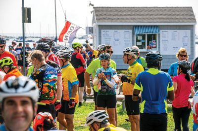 Cranberry Harvest Race
Participants in Sunday's Cranberry Harvest Race stopped at Mattapoisett Wharf to rest up and get some nourishment. The bike ride starting and finishing in Myles Standish State Forest in Plymouth also traveled through Carver, Rochester and Acushnet. Photos by Ryan Feeney
