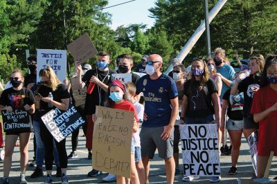BLM Rochester
A “Black Lives Matter” protest march drew hundreds to Rochester late in the afternoon of June 12. Escorted by several Rochester policemen on foot, participants who had gathered in front of Town Hall marched down Dexter Lane to the police station, where several individuals spoke about racism and told stories of discrimination based on skin color. The protest was organized by Wareham resident Alexis Sylvia, who had spent several years living in Mattapoisett and Rochester. Photos by Mick Colageo
