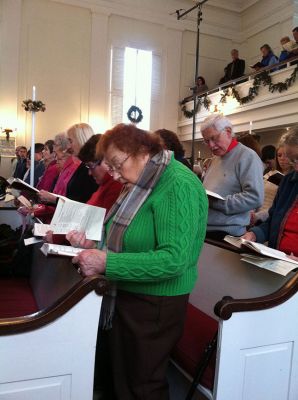 The Heart of Christmas
Marion’s First Congregational Church delivered the season’s perfection with Cassandra Morgan directing ‘The Heart of Christmas’ cantata. This annual event is sugar on the plums for anyone who appreciates live music.  The combined voices and instruments of over 60 performers filled the church with pitch perfect music telling the story of Jesus’ birth.  From bluesy pieces or full operatic compositions by Pepper Choplin the full house was delighted and moved tears to joy. Photo by Marilou Newell
