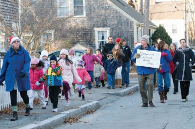Christmas Caroling 
Children created crafts then hit the streets for some old-fashioned Christmas caroling on Sunday, December 5, 2010. The event was sponsored by the Mattapoisett Historical Society. Photos by Felix Perez.
