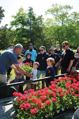 Marion Memorial Day
Jack LeFavor of Marion prepares a spot at one gravesite while James Whipple of Mattapoisett applies the finishing touches at another, as the two eight-year-old members of Marion Cub Scout Pack 32 help the Marion Department of Public Works plant flowers at all veterans’ graves in the Evergreen Cemetery on Saturday morning. The tradition, explained DPW representative Jody Dickerson, goes back to the Civil War. Evergreen is the largest of Marion’s five cemeteries. Photos by Mick Colageo
