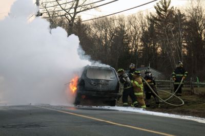SUV Fire
An SUV was completely consumed by a fire in Rochester on Braley Hill Road, on Saturday evening, January 7, 2012. A passing motorist saw the flames and helped direct the occupants to safety. No injuries were reported, but Police Chief Paul Magee reported that the vehicle was a "total loss". Photo by Laura Fedak Pedulli.
