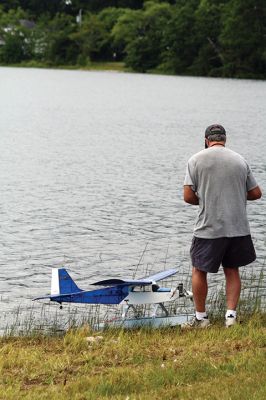 Bristol County Radio Control “RC” Club
Radio control model seaplanes are more than just a hobby for members of the Bristol County Radio Control “RC” Club. As club member Gerry Dupont puts it, “It’s an affliction. A happy affliction.” Dupont’s yellow Piper Cub seaplane features a one-fifth-scale pilot named “Gus” who’s been flying the one-fifth-scale seaplane for seven years. Photos by Jean Perry
