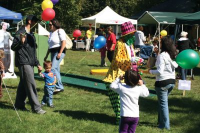 Grandparent's Day
It was a perfect autumn day for the SouthCoast Senior Resource Alliance Grandparents Day at Hiller Farm in Rochester on September 19. Children and their grandparents had fun playing bean-bag toss, bocce, posing with the Three Stooges, and more. The face-painting and petting zoo areas were a complete hit! Most importantly, the free event provided information to seniors on health services available in the SouthCoast area. Photo by Anne OBrien-Kakley
