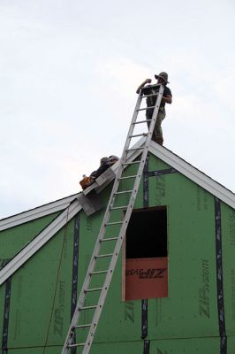 Buzzards Bay Area Habitat for Humanity
On Friday, a local mother and her two daughters were the beneficiaries of a new roof on their Route 6 house after Buzzards Bay Area Habitat for Humanity resumed its first home build in Mattapoisett. The project had been delayed by the COVID-19 pandemic. See story. Photos by Mick Colageo
