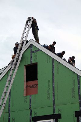 Buzzards Bay Area Habitat for Humanity
On Friday, a local mother and her two daughters were the beneficiaries of a new roof on their Route 6 house after Buzzards Bay Area Habitat for Humanity resumed its first home build in Mattapoisett. The project had been delayed by the COVID-19 pandemic. See story. Photos by Mick Colageo
