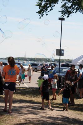 Harbor Days 
Harbor Days came to Mattapoisett this past weekend, and many visitors were gracious enough to spin The Wanderer Wheel for a $1 donation to the Lions Club. Those who played helped raise an extra $523 the Lions Club will use to benefit the community. The Aardvark came out too, but since furry aardvarks hate hot weather, he only made a couple of appearances. Photos by Jean Perry
