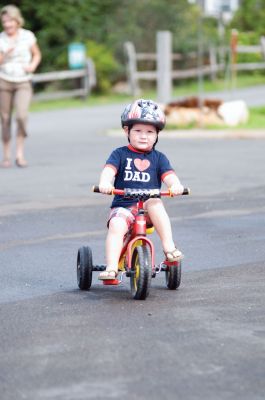 Heritage Days 2011
Children festooned their bicycles and enjoyed a ride around the village as a part of the 2011 Mattapoisett Heritage Days on August 6. Other Saturday activities included guided village tours, an evening concert and a treasure hunt. Mattapoisett bustled with activities on Saturday, but the bonfire was canceled due to wind, and many Heritage Days activities were canceled on Sunday due to heavy rain. Photos by Felix Perez.
