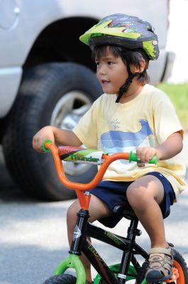 Heritage Days Bike Parade
Dozens of children gathered at the Center School to showcase their best bicycles and doll carriages in a parade for Heritage Days. Photo by Felix Perez. 
