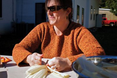 Autumn Celebration
Mattapoisett Historical Society Museum curator Elizabeth Hutchinson makes corn husk dolls at the museum's fall celebration on Saturday, October 13, 2012.  Photo by Eric Tripoli
