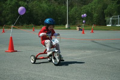 Bikes, Bikes, Bikes!
The Third Annual Pan Mass Challenge Kids Tri-Town Ride attracted several hundred young bicyclist to the ORR campus on Saturday morning, May 16, for a bike rally to help defeat cancer. Proceeds from the event will go to several charities in the state such as the Jimmy Fund and Dana- Farber Cancer Institute to assist in cancer research. The rally was expected to raise more than $15,000. Photo by Robert Chiarito.
