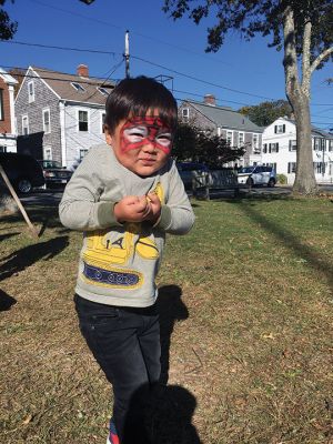 Family Fun Festival 
Families came out in record numbers to enjoy the 4th Annual Fall Free Family Fun Festival sponsored by the Mattapoisett’s Lion Club on October 19 held at Shipyard Park. Bruce Rocha of the club estimated attendance at over 400. Kids and adults alike enjoyed free face painting, bowling with pumpkins, a corn hole toss, snacks, hayrides to Ned’s Point and, yes, free pumpkins to take home. Photos by Marilou Newell and Sandra Frechette
