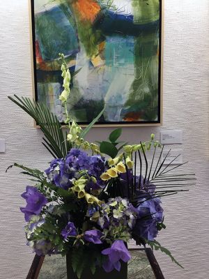 Marion Art Center 
On June 23, the Marion Art Center held its annual Art in Bloom reception. The popular event pairs floral arrangements with paintings in what can to liken to a 3D visual art profusion. This year's art featured the abstract expressions of Pat Warwick, Alyn Carlson and Pat Coomey Thornton. Floral arrangement taking inspiration from 11 of the paintings on exhibit were styled by Wendy Bidstrup, Brett Bidstrup, Veronique Bale, Joan Gardner, Karilon Babbit-Grainger, Connie Dolan, Minnie Plumb, Suzie Kokkins, Chad 
