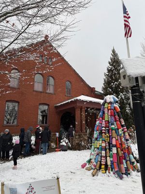 Marion Village Christmas Stroll
The Marion Village Christmas Stroll was this past cold and snowy Sunday. Santa and Ms. Clause arrived by their usual boat, though the cold and the wind sure made it look difficult to dock. Excited kids hurled snowballs all around (and at each other) as they waited for St. Nick. Photo by Sam Bishop
