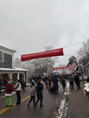 Marion Village Christmas Stroll
The Marion Village Christmas Stroll was this past cold and snowy Sunday. Santa and Ms. Clause arrived by their usual boat, though the cold and the wind sure made it look difficult to dock. Excited kids hurled snowballs all around (and at each other) as they waited for St. Nick. Photo by Sam Bishop
