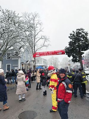 Marion Village Christmas Stroll
The Marion Village Christmas Stroll down Front Street. The stroll was on Sunday, December 14. Alanna Nelson said in the 31 years the town has had the stroll, this is the first time anyone remembers it snowing! Due to the snow, Santa wasn’t able to ride his horse-drawn carriage around town. Instead, he was sitting just outside the Marion Music Hall. Photo by Sam Bishop -December 18, 2025 edition
