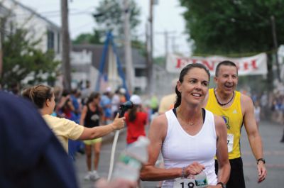 Mattapoisett Road Race
On Wednesday, July 4, over 1,000 runners braved the rain to participate in the Annual Mattapoisett Road Race.  All money raised from the 5-mile race will benefit graduating students from Old Rochester Regional High School.  Photo by Felix Perez.
