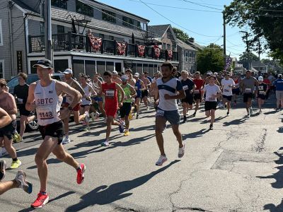 Mattapoisett Road Race
The 55th Mattapoisett Road Race was held on Independence Day kicking off from Shipyard Park as morning temperatures at start already crept over 85. In the end, 1387 racers crossed the finish line after the 5K. Photos by Shawn Sweet
