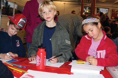 Mattapoisett Fire Station Open House
The Mattapoisett Fire Station was packed with hundreds of children and their grown-ups for the October 9 Open House during Fire Prevention Week, enjoying the balloons, face painting, plastic firefighter hats, and free Chinese food. Kids got the chance to climb over the fire trucks and stop, drop, and roll inside the Kids’ Fire Safety House. Photos by Jean Perry 
