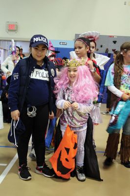 Annual Halloween Costume Contest 
The Mattapoisett Police Department’s Annual Halloween Costume Contest had spectators spinning in circles as the most creative than ever costumes paraded around the Center School gymnasium Thursday night. The costumes were such a hit, even the judges had a hard time choosing the winners of each age group. Photos by Jean Perry

