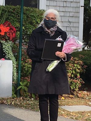 Mattapoisett Retiries 
Four recently retired, municipal employee relations were honored Tuesday afternoon for their long tenure and service to Mattapoisett and its residents at an outdoor ceremony. The four retirees are former Library Director Susan Pizzolato (11 years), former assistant Harbormaster Bob Ketchel (25 years), and Highway Department employees Jay DuPont (19 years) and Roger Fleurent (12 years). Pizzolato and Ketchel also received citations from the House of Representatives and the state senate. 
