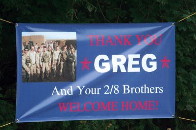 Homecoming
Marine Corps Lance Corporal and Mattapoisett resident Greg Rosperich, returned from a second tour of duty in Afghanistan last week. Army Sergeant Ryan McGrath also returned on Thursday, September 1. Mattapoisett resident Kim Corazzini, a friend of the Rosperich family, led over 20 volunteers to give the men a proper welcome, which included lining Route 6 with yellow ribbons, American flags and welcome home signs. Photo by Anne Kakley.
