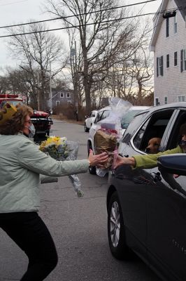 Melody Pacheco
On March 17 family, friends, and co-workers came out in force to beep and wave at retiring Mattapoisett Town Hall employee Melody Pacheco, who ended her 35-year career after serving in a variety of capacities, including assistant to the town administrator, for over a decade. While Pacheco looked on from the steps of Town Hall, all in attendance wished her a very happy retirement with cheers of “Thank You” and tears of gratitude. Photos by Mick Colageo

