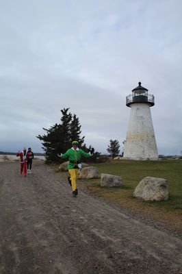 Mattapoisett Santa Stampede
The Mattapoisett Santa Stampede took place on Saturday, December 6 with over 300 Santas taking place. The 5K began at Shipyard Park and cut down Ned’s Point Road to the point, around the lighthouse and back. The Grinch led the pack on his bike, and residents stood by to cheer on all the runners. Photos by Sam Bishop and Mick Colageo
