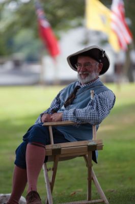Heritage Days 2011
Militia participant Chris Richard sits and enjoys the festivities at the annual Fairhaven Village Militia encampment during Mattapoisett's Heritage Days on August 6, 2011. Photo by Felix Perez.
