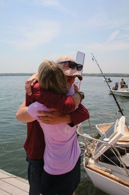 Cooper Newton 
Cooper Newton received an emotional welcome home from his parents Peter and Marley Newton, his girlfriend Autumn Horsey and a host of extended family and friends. The Mattapoisett native sailed his 27-foot boat Why Worry on a solo journey that took him as far as Turks and Caicos south of the Bahamas. His adventures included a surprise passenger in a raccoon that found his boat during a coastal storm. Photos by Mick Colageo and Cooper Newton
