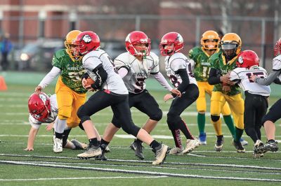 Old Rochester Youth Football’s
Old Rochester Youth Football’s 12-and-under team was the last Massachusetts entry among the eight programs represented in the four New England Pop Warner Regional Championship games held on Saturday at New Milford (Connecticut) High School. The Bulldogs earned some opportunities, thanks to great defensive plays like Nicholas Giokas’ first-quarter interception, a fumble forced by Benjamin Baptiste and recovered by David Medeiros Jr., 

