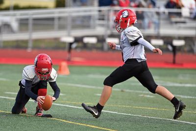 Old Rochester Youth Football 
Connor Nelson of the Old Rochester Youth Football 12-and-under team holds the snap as Giovanni Scherer kicks a field goal during the Bulldogs’ recent 30-24 victory over previously undefeated Manchester, Connecticut. Photo courtesy of Phil Mello
